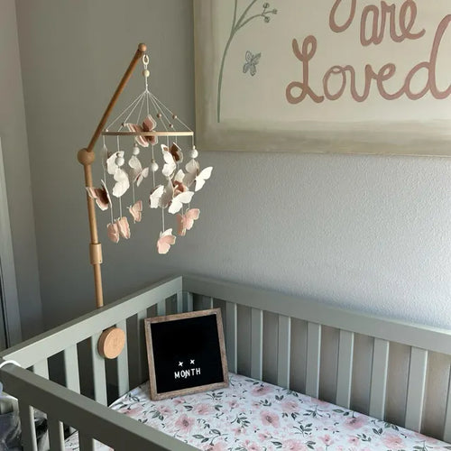Blush pink butterfly and flowers felt mobile in nursery – handmade floral baby mobile over crib