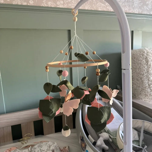 Felt butterfly and flowers baby mobile in sage green nursery – handmade floral crib mobile with pink pom-poms