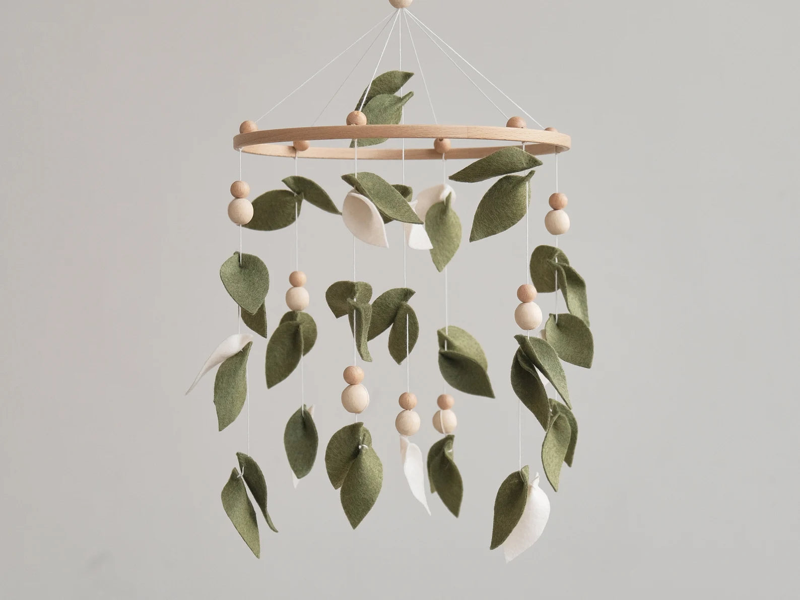 Felt baby mobile with sage green leaves and cream petals – nature nursery crib mobile
