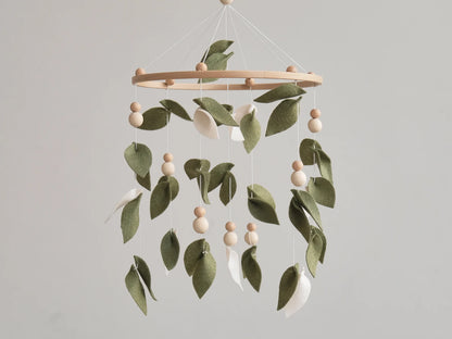 Felt baby mobile with sage green leaves and cream petals – nature nursery crib mobile