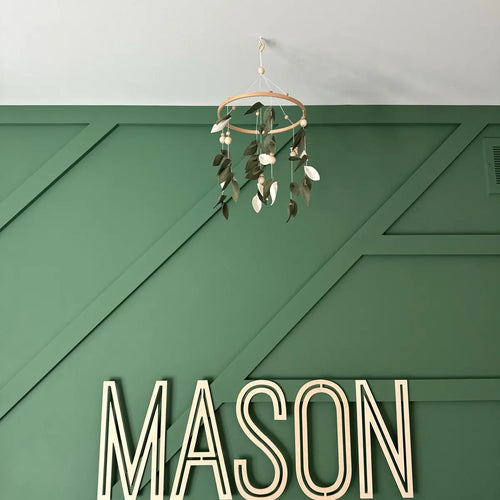 Felt green leaves crib mobile in nursery – eucalyptus baby mobile on green accent wall