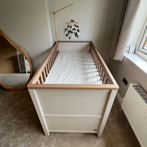 Felt green leaves baby mobile over wooden crib – handmade eucalyptus mobile in neutral nursery