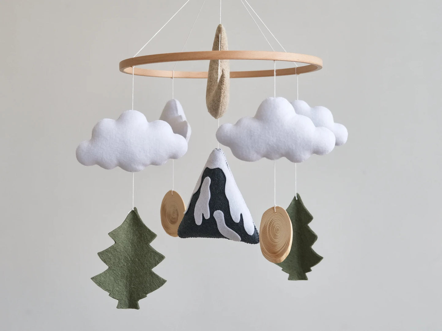 Felt baby mobile with snowy mountain, clouds and fir trees – woodland crib mobile with wood slices