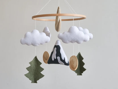Felt baby mobile with snowy mountain, clouds and fir trees – woodland crib mobile with wood slices