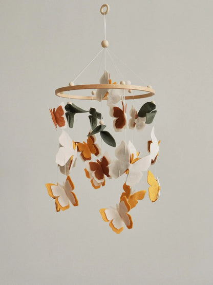 Handmade felt baby mobile with butterflies and leaves in amber, terracotta and cream – neutral boho nursery crib mobile