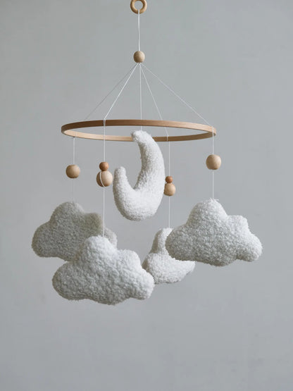 Handmade plush crib mobile with boucle moon and four white clouds with wooden beads