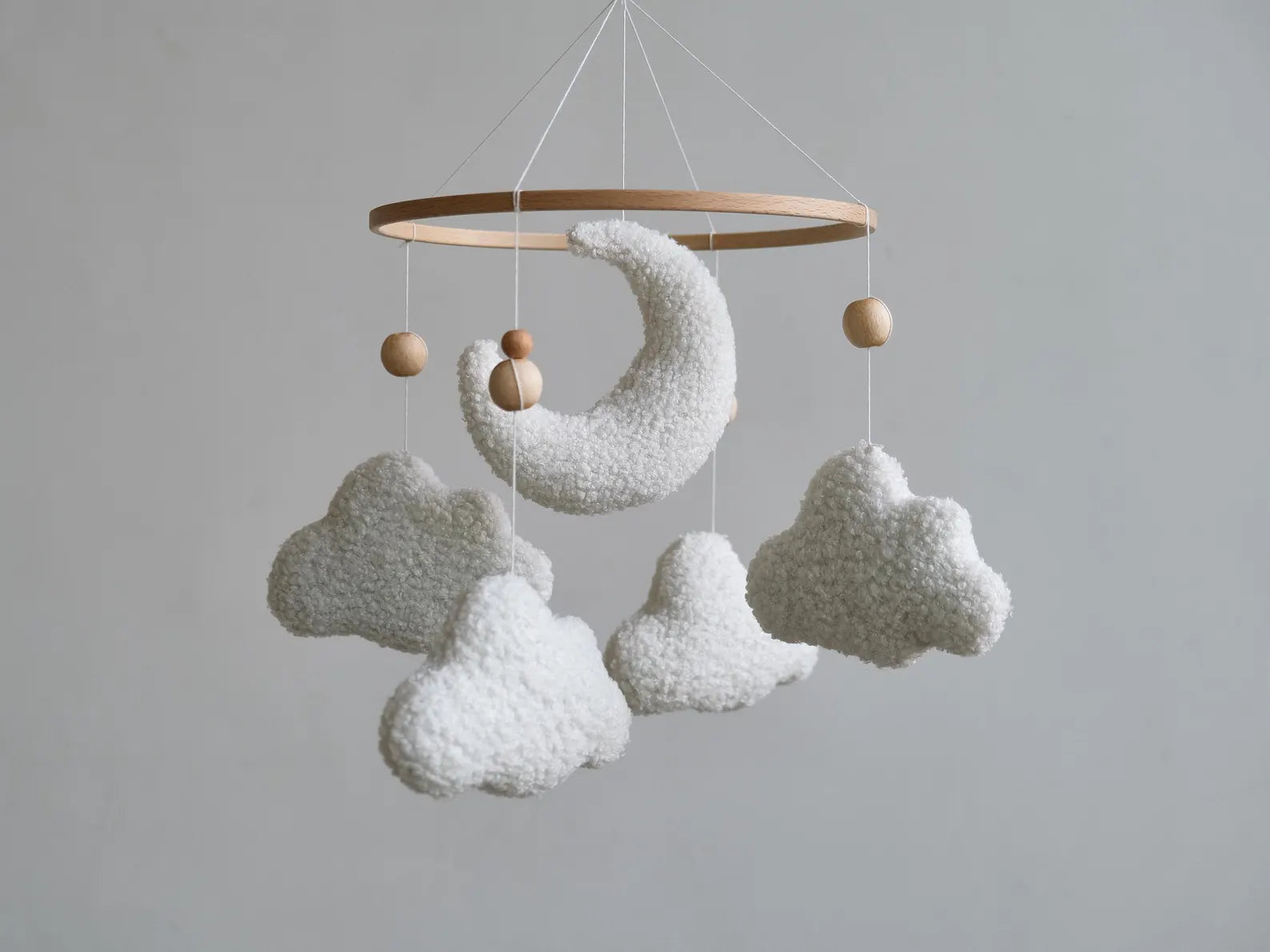 White boucle cloud and moon baby mobile with natural wooden ring and beads