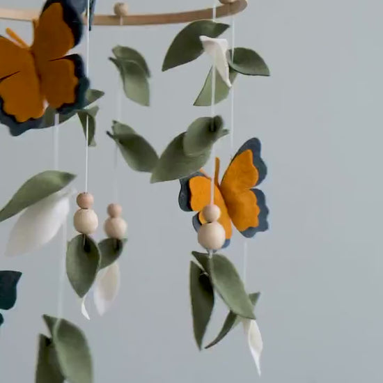 Video of felt baby mobile with monarch butterflies and leaves – handmade nursery crib mobile