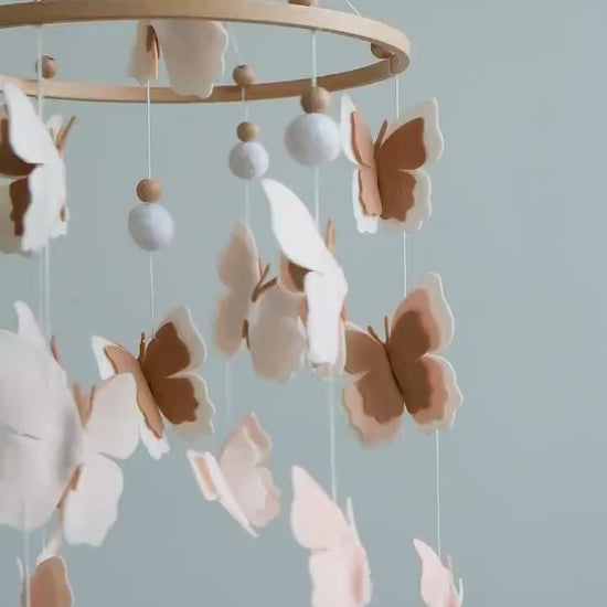Video of felt baby mobile with blush butterflies – handmade neutral nursery crib mobile