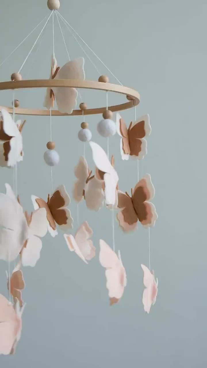 Video of felt baby mobile with blush butterflies – handmade neutral nursery crib mobile