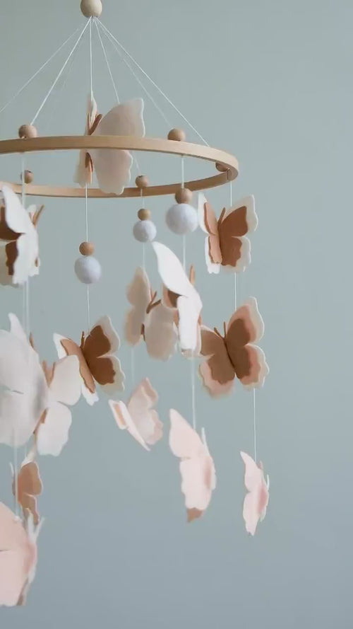 Video of felt baby mobile with blush butterflies – handmade neutral nursery crib mobile