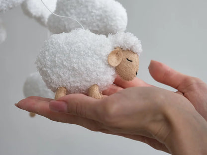 Baby mobile with boucle sheep and cloud accents, soft nursery decor for newborn