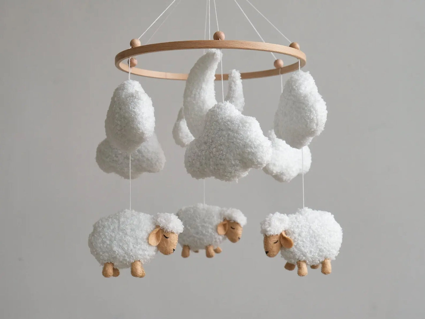 White boucle cloud baby mobile with six clouds and moon, minimalist nursery crib mobile