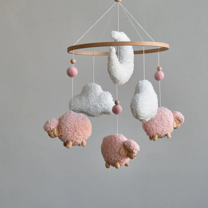 Pink boucle sheep baby mobile with white clouds and moon for girl nursery