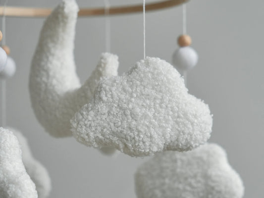 Boucle cloud close-up on soft baby mobile – handmade textured plush cloud nursery mobile detail